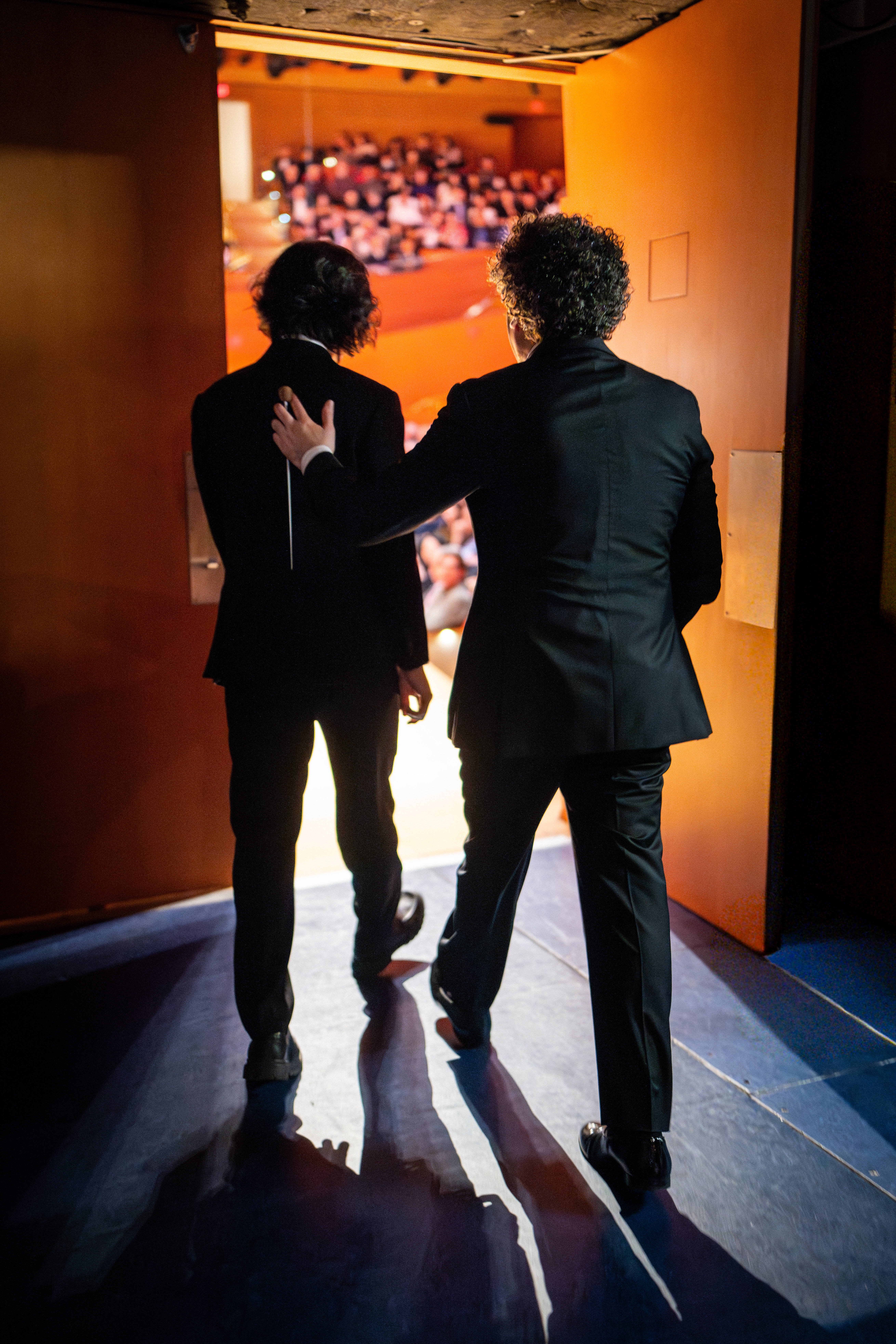 Gustavo Dudamel and Yunchan Lim walking onto the stage.