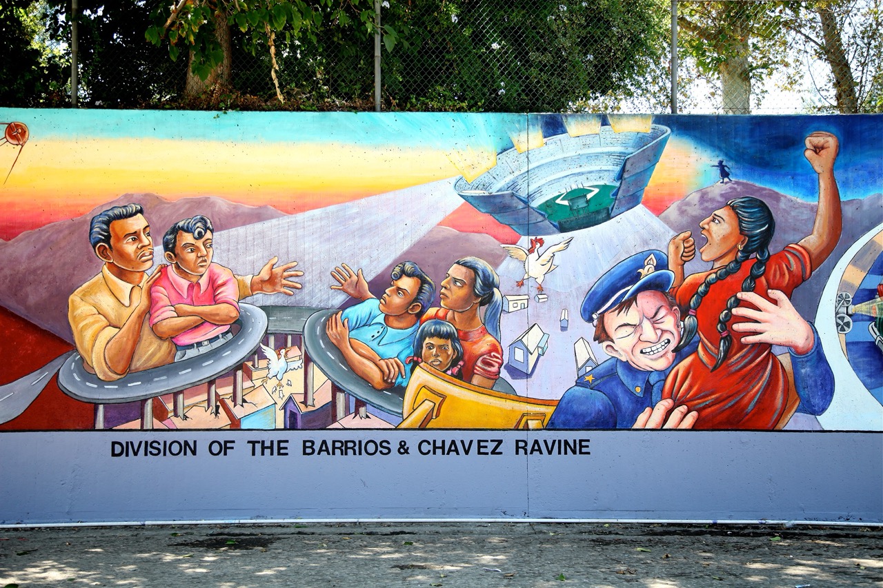 Judy Baca(c)1983, "Division of the Barrios &amp; Chavez Ravine" detail from the 1950s section of <em class="notranslate">The Great Wall of Los Angeles</em> mural.
